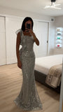 STRAPLESS RUFFLE SIDE SEQUIN GOWN